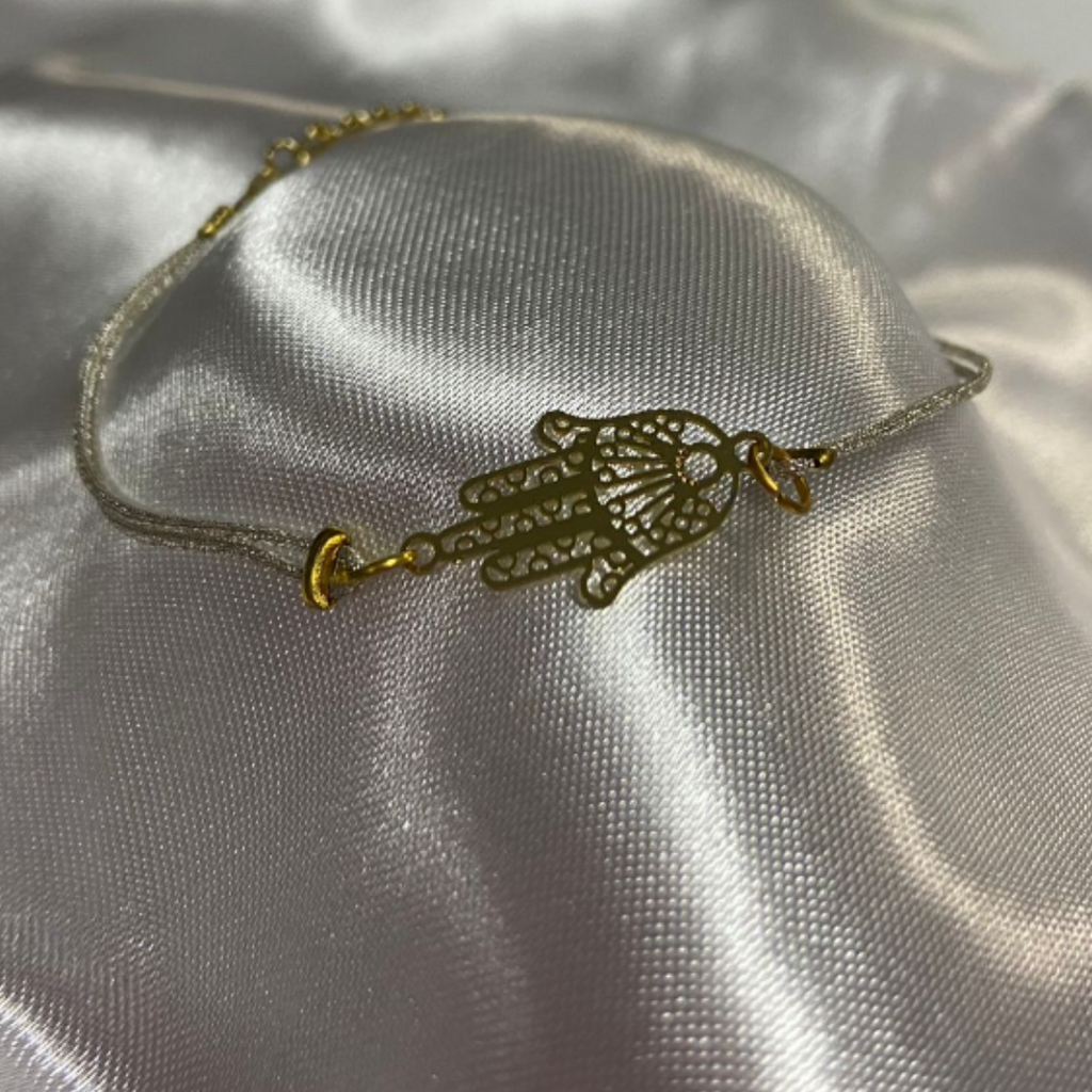 PULSERA HILO PLATEADO CON BROCHE Y SHEMA