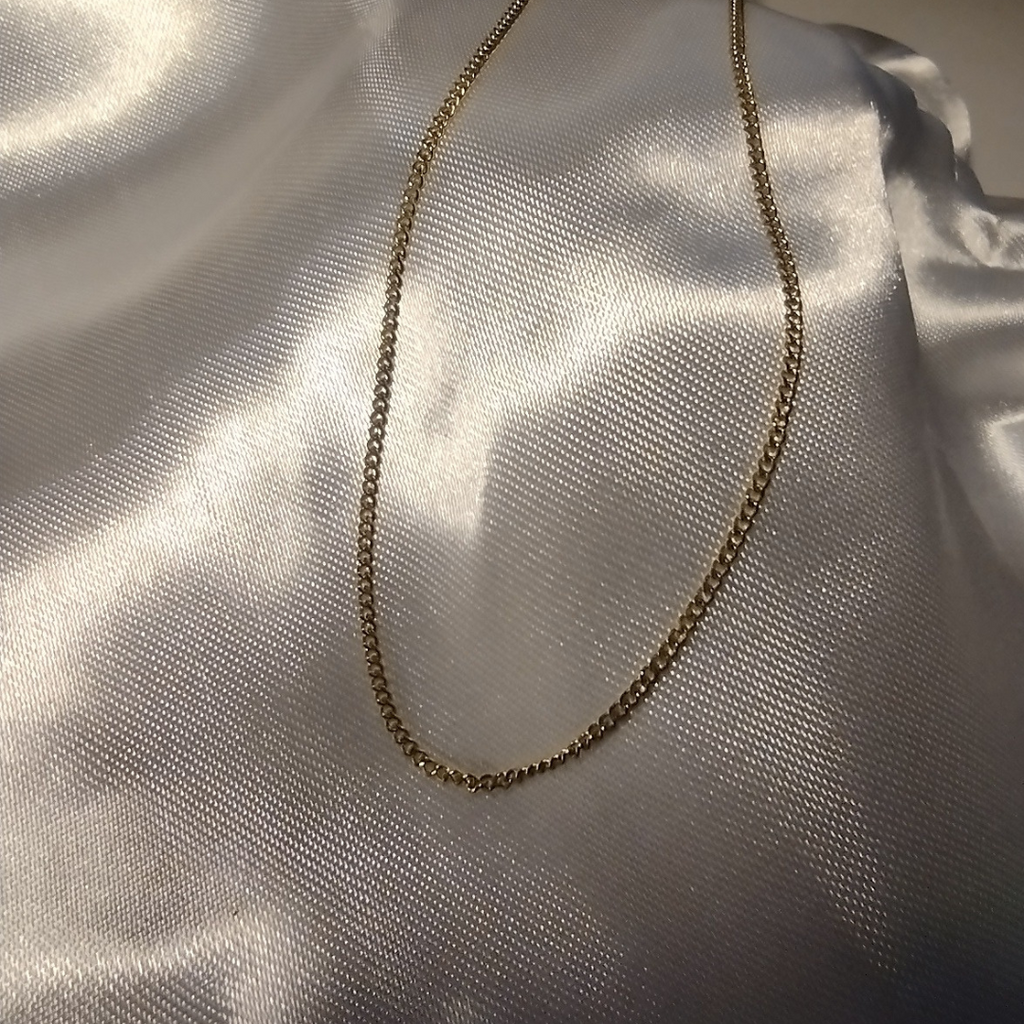 CADENA ACERO DORA FINA