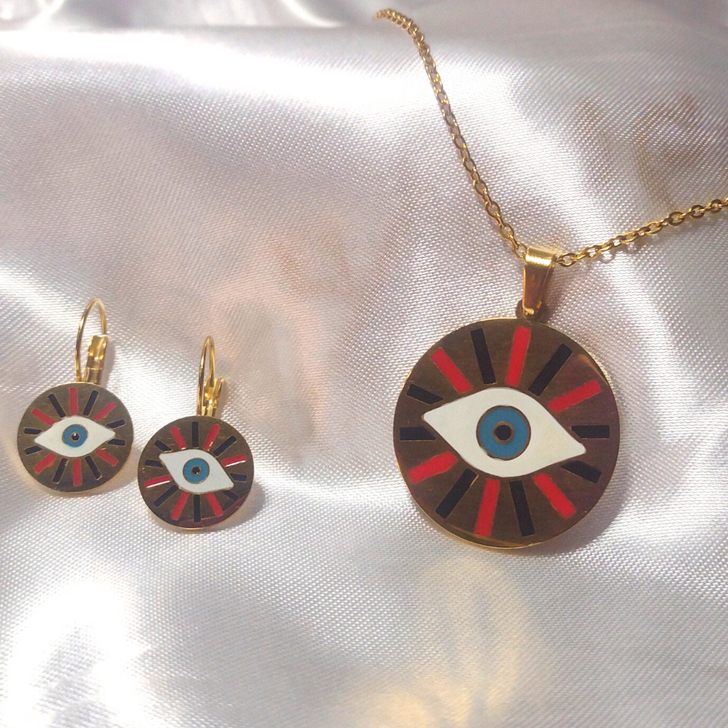 JUEGO DE CADENA Y ARETES OJITO